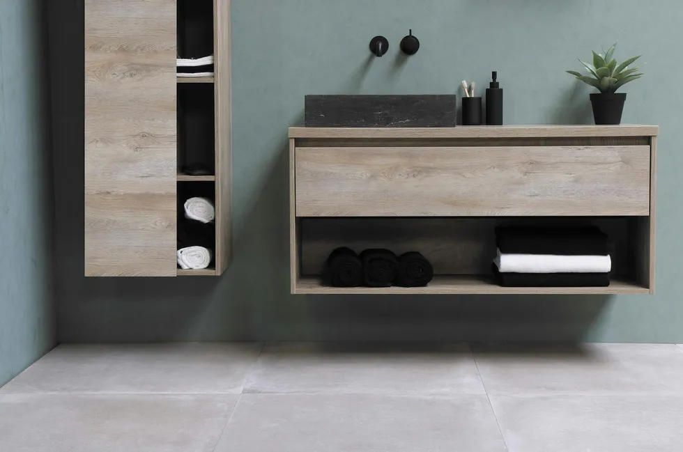 Floating vanity over large-format tile